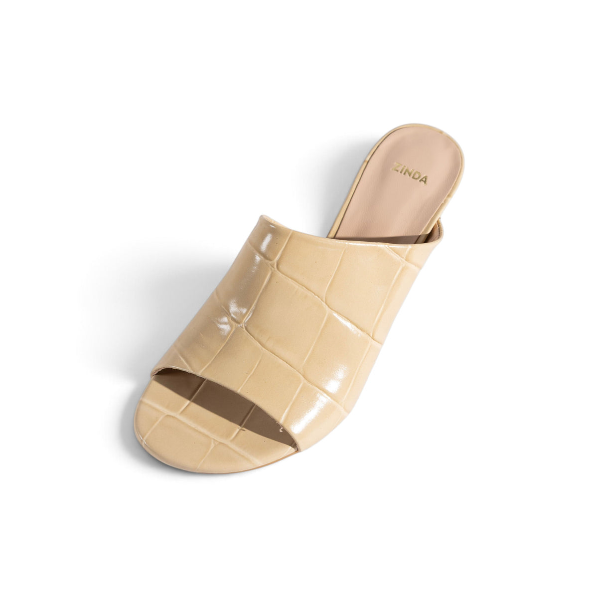Alba Champagne Sand croc-embossed leather mule, close-up showing textured upper, by Estela