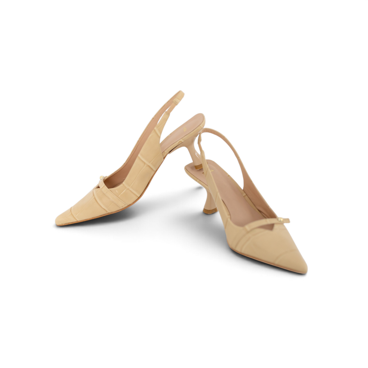 Inés Champagne Sand croc-embossed leather slingback on white background, by Estela